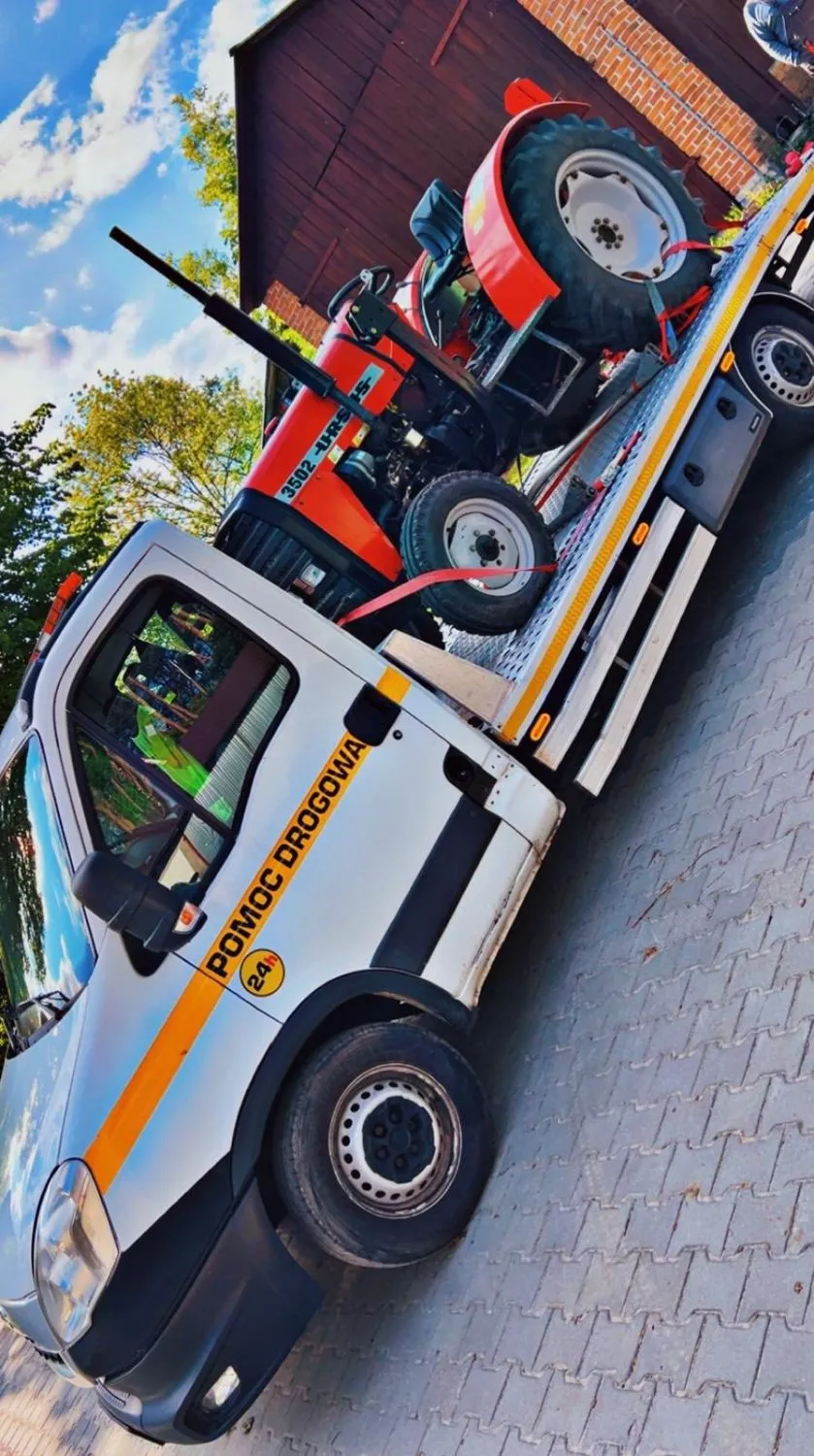 zdjęcie przedstawiające POMOC DROGOWA - Laweta- Transport KORDI-CAR